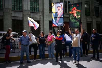 Image for Restoring democracy in Venezuela must respect its people's will, EU countries say