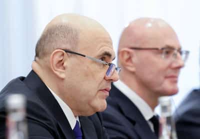 Image for China, Russia vow joint response to 'unilateral' sanctions during Russian PM visit