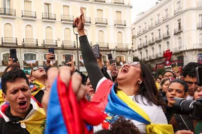 Image for Venezuelan opposition activists in Madrid warily cheer Maduro capture