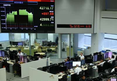 Image for World equities hit record highs, US yields fall on optimism for Fed rate cut