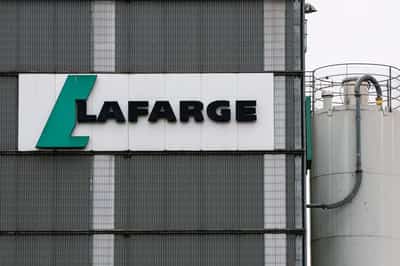 Image for French cement maker Lafarge faces trial on charges of financing jihadists in Syria