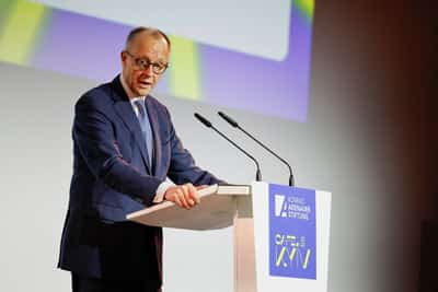 Image for Germany's Merz: disqualified Olympian's helmet symbolizes Ukraine's courage