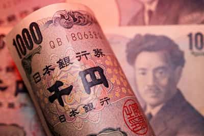 Image for Yen jumps sharply as Japan warns it is ready to intervene again