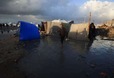 Image for Six dead as Gaza’s displaced struggle to hold ground in torrential rain