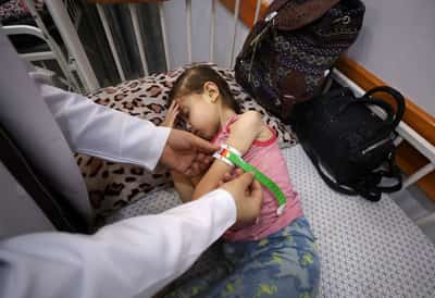 Image for Gaza's hungry children slide towards starvation as emergency treatments dwindle