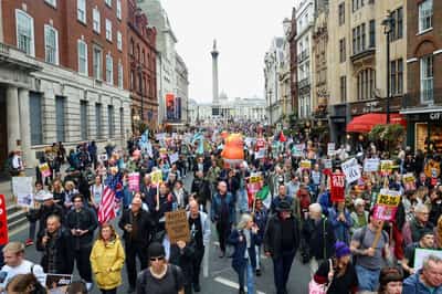 Image for Anti-Trump protesters march through London as president basks in royal welcome