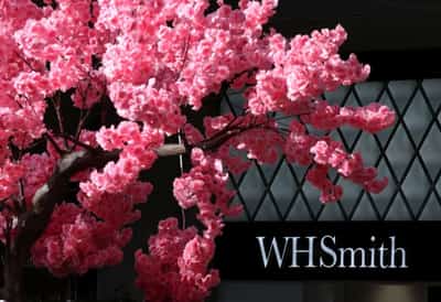 Image for UK's WH Smith cuts profit forecast after accounting blunder, shares sink