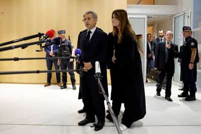 Image for French model and singer Carla Bruni stands by her man after Sarkozy jail sentence
