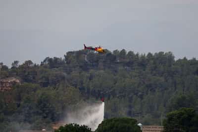 Image for More than 18,000 people in lockdown as wildfire rages in Catalonia