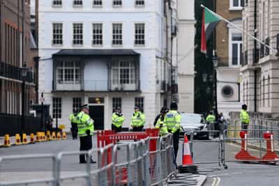 Image for Police and protesters scuffle as 110,000 join anti-migrant London protest