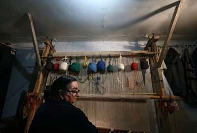 Image for Georgia's ethnic minority women keep ancient rugweaving art alive