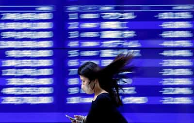 Image for Stocks tumble, dollar up as Middle East war lights safe-haven trade