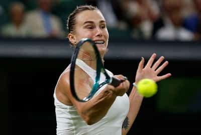 Image for Tennis-Sabalenka fights off Raducanu, Alcaraz marches on, Keys and Osaka crash at Wimbledon