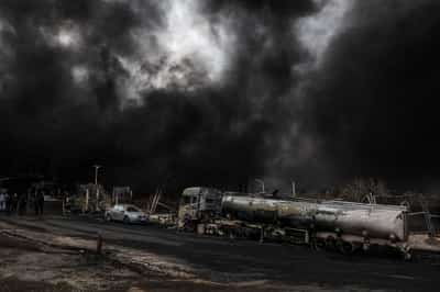 Image for Both sides dig in, as Iran war approaches two-week mark