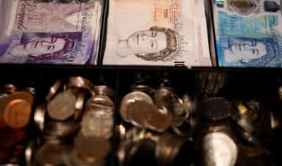 Image for Sterling ticks higher against dollar as economy slows less than expected
