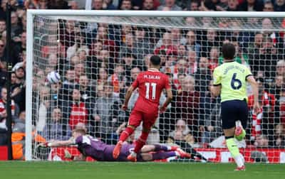 Image for Soccer-Liverpool open up 16-point league lead; Forest beat City