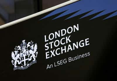 Image for London stocks edge higher on upbeat corporate results