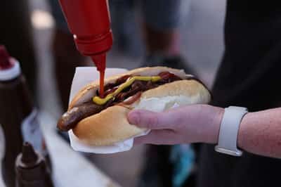 Image for Australians sizzle on election day with 'democracy sausage' and 'budgy smugglers'