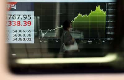 Image for Asian shares track Wall Street to record highs but higher oil prices a risk