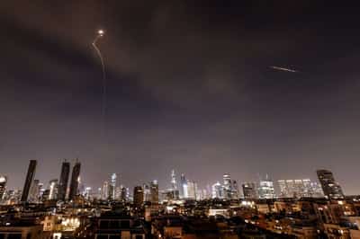 Image for Iran sends waves of missiles into Israel, dismisses Trump's talk of negotiations as 'fake news'