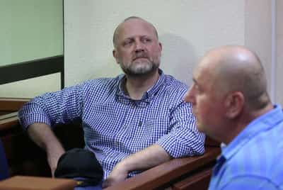 Image for Georgia jails three opposition politicians, including bank founder