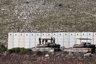 Image for Exclusive-Hezbollah returns to guerrilla roots, awaits Israeli invasion