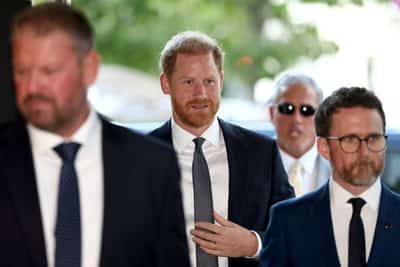 Image for World has thrown challenges, Prince Harry says on return to UK
