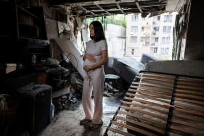 Image for Pregnant in Kyiv, in the wreckage of apartment hit by Russian drone