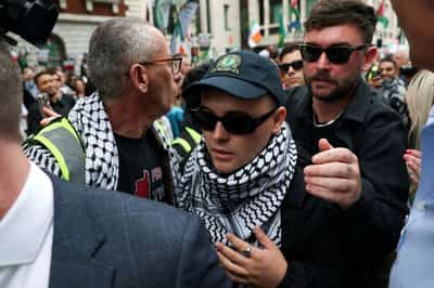 Image for Canada bans Irish rap group Kneecap over alleged support for militants