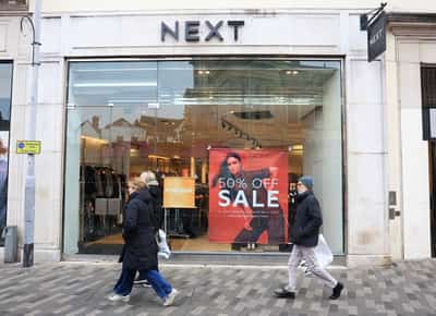 Image for UK's Next lifts profit outlook as warm weather, M&S disruption boost trade