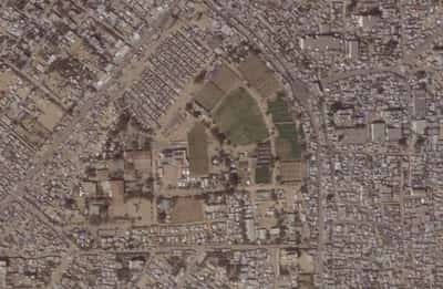 Image for With nowhere else to shelter, Palestinians displaced in Gaza return to a city under Israeli assault