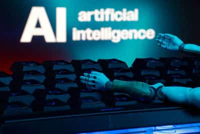 Image for AI spending frenzy could reshape the economy, Bridgewater CIOs say