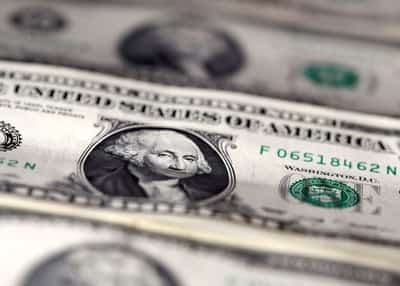 Image for US dollar tumbles after Fed cuts rates, Powell comments