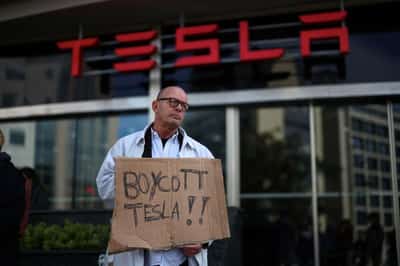 Image for Dozens protest at Tesla showroom in Portugal ahead of likely snap election