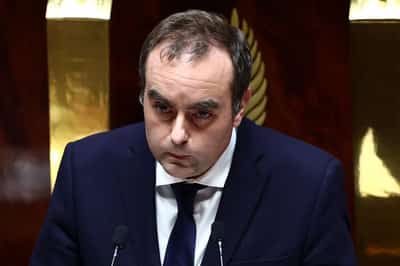 Image for French PM faces fraught budget talks after surviving no-confidence votes