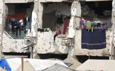 Image for Gaza storms bring flooding, sewage and misery in tent camps