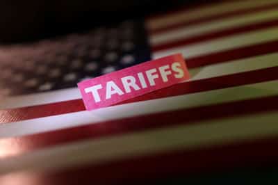 Image for Analysis-Global economy's 'sugar rush' defies trade drama - for now