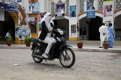 Image for Analysis-Soaring costs, fuel shortage fears drive Pakistan to electric motorbikes