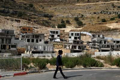 Image for Norway fund's ethics body reviews Israeli bank stakes over West Bank settler loans