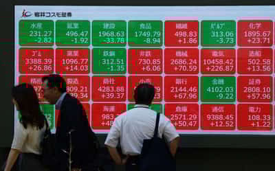Image for Stocks climb, dollar dips with US-China trade talks eyed
