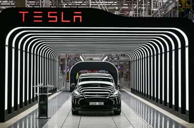 Image for Tesla likely faces 'a few rough quarters' from end of US EV support, Musk says