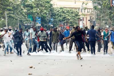 Image for Man shot by Kenyan police during protests is in intensive care, father says