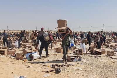 Image for Overcrowding forces halt to Gaza aid distribution, Eid holiday marked by violence