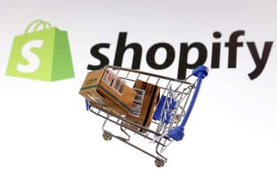 Image for Shopify delivers upbeat revenue forecast on resilient demand, shares surge