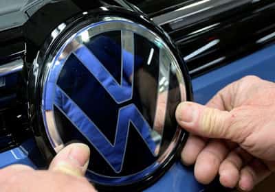 Image for VW production continuing for now but chip uncertainty high, source says