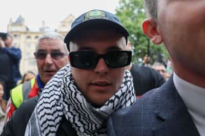 Image for Member of Irish rap group Kneecap appears at UK court on terrorism charge