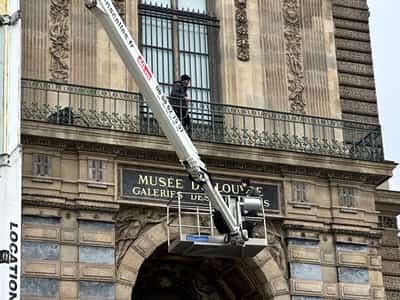 Image for Louvre museum installs security bars on balcony used in October's heist