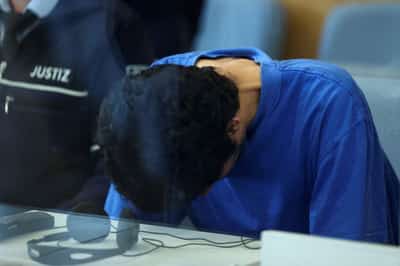Image for Germany tries Syrian man over deadly stabbing that stoked migration debate