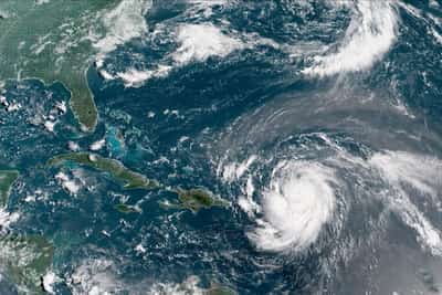 Image for Erin downgraded to Category 3 hurricane, NHC says