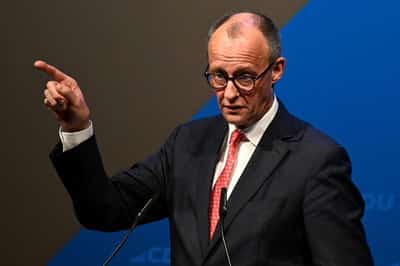 Image for German Chancellor Merz heads to China seeking openings as global pressure builds